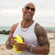 Dwayne Johnson, laughing about how much better he is than you on HBO's Ballers